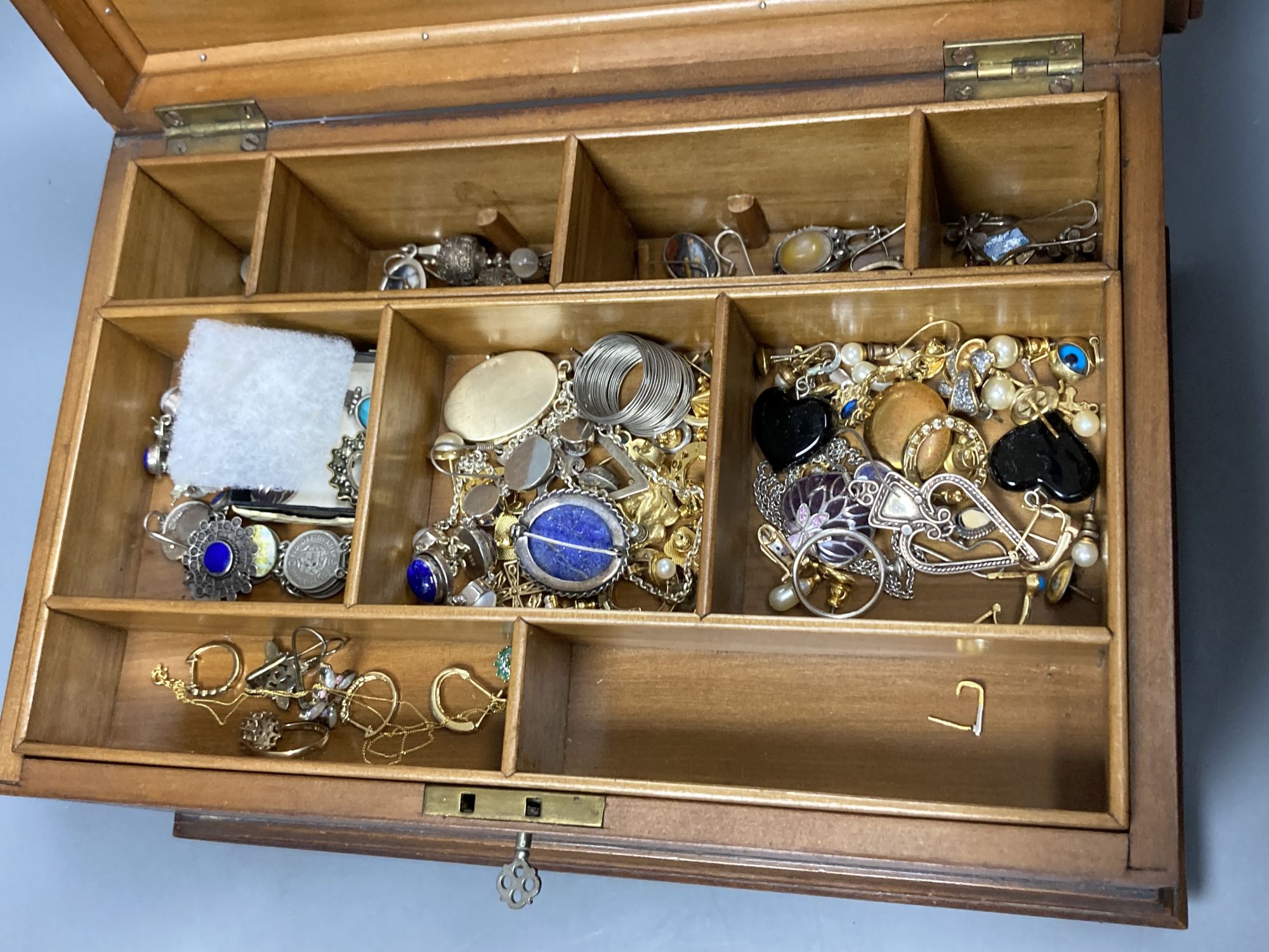 A 9ct gem set ring, a 9ct gem set pendant, a pair of Arts & Crafts gem set gilt white metal earrings and other jewellery including costume.